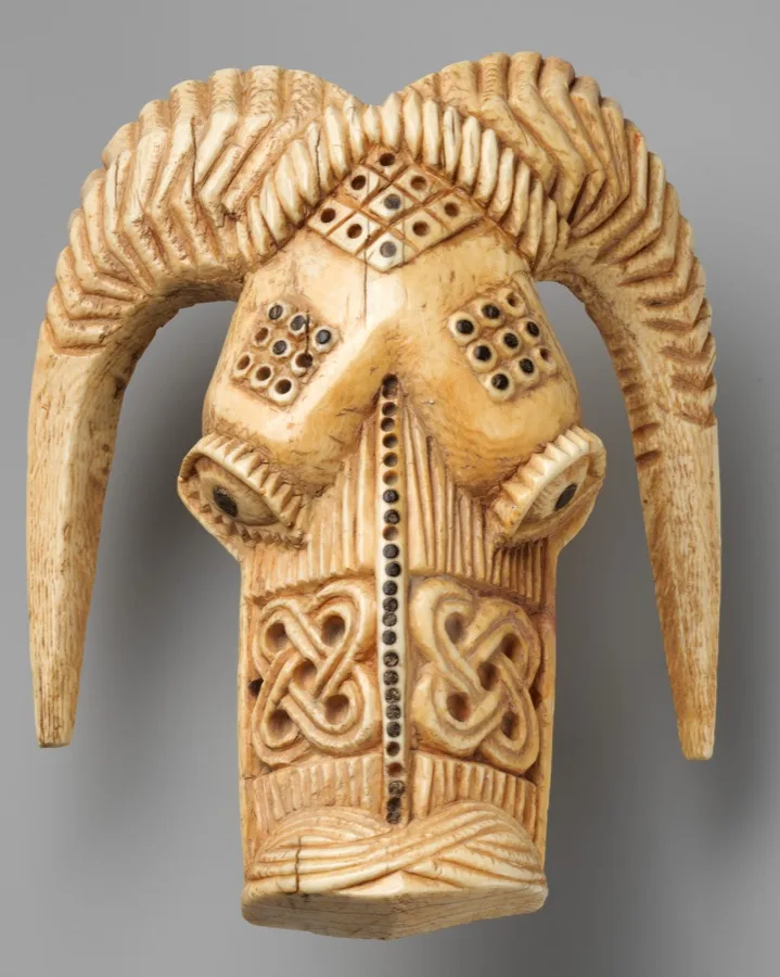 Orufanran Costume Attachment: Ram Head — Yoruba peoples, Owo group, 17th–19th century. Ivory with wood or coconut shell inlay.